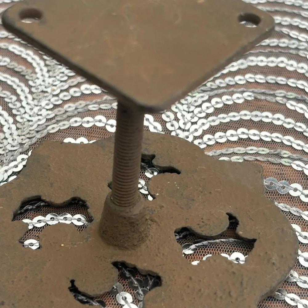 Antique cast iron curtain accents